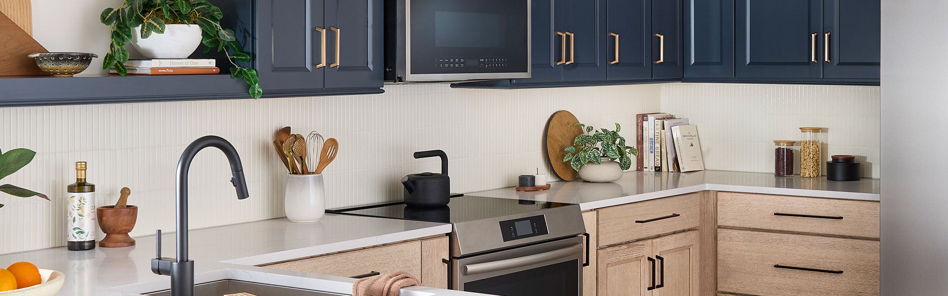 A kitchen featuring Ivan decorative hardware.